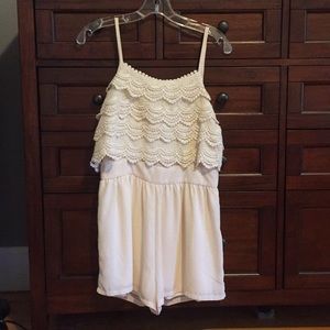 Romper size Medium. Worn once!!